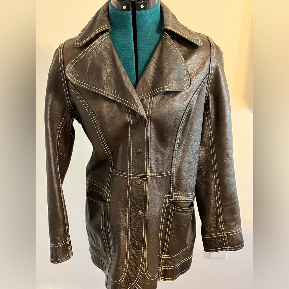 Retro/vintage brown leather jacket with white stitching